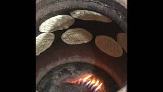 MAKING NAAN BREAD IN TANDOOR  PAKISTANI INDIAN GARLIC BREAD  Shorts [upl. by Rentsch127]