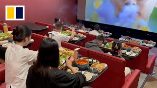 Moviegoers indulge in growing trend of ‘hotpot cinema’ [upl. by Patnode]