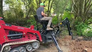 Iron Rhino Backhoe Attachment on an IR1000 [upl. by Hsiwhem]