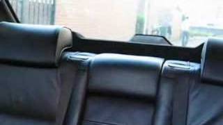 E38 BMW 740i Automatic folding headrests rear [upl. by Burrell]