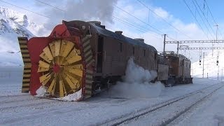 Snow Plowingtrainfart originalDampfschneeschleuder Xrot d 9213 und Bernina Krokodil  Zug train [upl. by Iclehc]