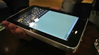 Tactus Technology Shows Us Their New Keyboard Tech CES 2014 [upl. by Esinnej]