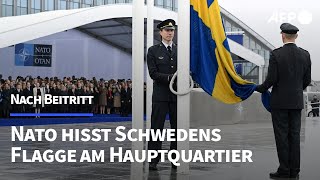 Nato hisst Schwedens Flagge am Hauptquartier in Brüssel  AFP [upl. by Stevena529]