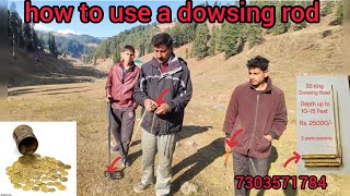 how to use a dowsing rod how to find a dowsing rod metal detectingGold field hunting [upl. by Neirbo321]