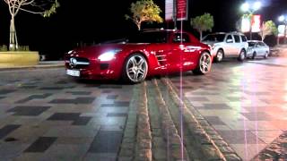 red MercedesBenz SLS 63 AMG  drive by  Dubai Marina [upl. by Holleran]