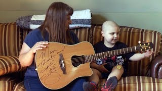 Garth Brooks stops concert to gift guitar to cancer survivor [upl. by Eivla]