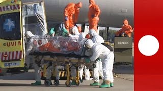 Video First Ebola victim arrives in Spain under tight security [upl. by Anairb]