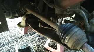 How to replace a driveshaft Front wheel drive cars [upl. by Aisat879]