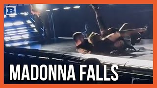 65YearOld Madonna Falls Off Chair Being Pulled by Man Running in Heels [upl. by Farrel607]