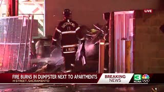 Fire burns in dumpster behind Sacramento apartment building [upl. by Enwad45]