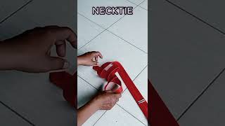 HOW TO MAKE SMALL TIE KNOT HAND TRICK  HAND TRICK SHORT [upl. by Kannry]