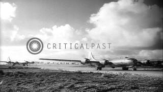 USAAF B29 Superfortress bombers drop bombs over industrial targets in Tokyo JapHD Stock Footage [upl. by Alyak]