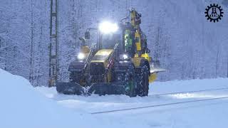 Huddig Rail backhoe loader in snow clearing with Snowsweeper snowplow [upl. by Barclay]