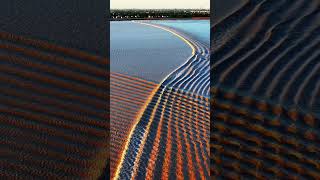 The Qiantang River Fish Scale Tidal Bore at Sunset [upl. by Ritter222]