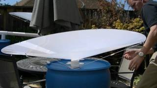 RainSaucers Install Video clean simple no gutters free standing rain barrel [upl. by Ener]