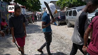 Vigilantes in Haiti strike back at gangsters with brutal street justice [upl. by Rock]