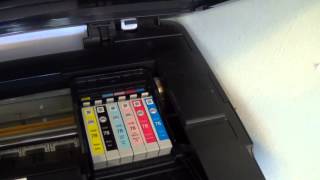 How to Replace a Printer Cartridge for an Epson Stylus Printer [upl. by Airemaj]