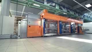 Fully automatic final packaging of beverage cartons in a toploading machine from Schubert [upl. by Abas]