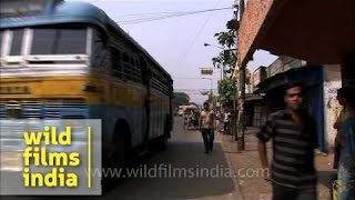 Traffic crawls on a road in Kolkata [upl. by Edison]