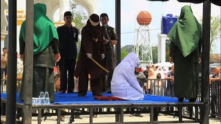 Indonesia lapplicazione della sharia per le coppie non sposate [upl. by Sonstrom]