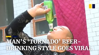 Chinese man’s ‘tornado’ beerdrinking style becomes online sensation [upl. by Faden]