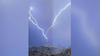 Lightning strikes in Saudi holy city of Mecca as rain floods its streets  AFP [upl. by Dviad]