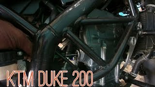 KTM duke 200 changing the cam chain tensioner [upl. by Ianteen]