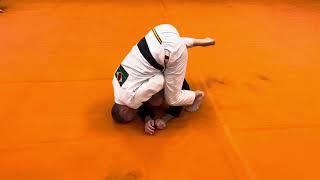 Sliding Lapel Choke Attempting the Clock Choke and Rolling Over the Top for the Finish [upl. by Noyk]