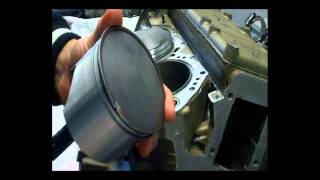 How to install Outboard Pistons when rebuilding your outboards motor [upl. by Oivatco390]