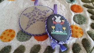 How to finish a cross stitch pieces into a round or oval ornament [upl. by Alleahcim747]