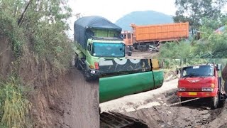 tark excavator turun pegunungan PS Fuso Hino 500 turunkan muatan dari tikungan menanjak [upl. by Aiouqes977]