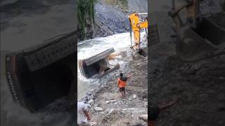 Pulling overturned JCB from Trishuli rivershorts viral excavator [upl. by Mervin]