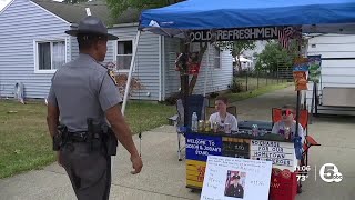 Boys use lemonade stand to help fallen officers family [upl. by Ayalat]