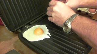 How to quotFryquot Eggs on the George Foreman Grill [upl. by Yentterb863]