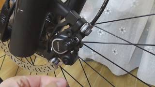 How to fix rubbing Hydraulic Disc Brakes on a bicycle [upl. by Nanice]