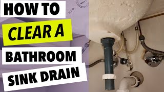 How To Clear A Clogged Bathroom Sink Drain [upl. by Dody536]