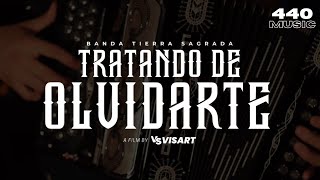 Banda Tierra Sagrada   TRATANDO DE OLVIDARTE  Video Oficial [upl. by Aem]