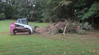 Loading Brush in 30 yard dumpster with Takeuchi TL150 [upl. by Jennica]