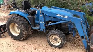 Change fuel filter New Holland tractor [upl. by Ebanreb]