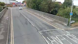 bus passing run down houses near Highbridge Somerset England14624 [upl. by Tlok]