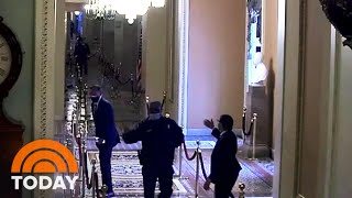 Hero Officer Eugene Goodman Directs Mitt Romney To Safety In Capitol Riot Video  TODAY [upl. by Reinold]