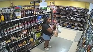 Surveillance video shows Ta’Kiya shoplifting bottles of alcohol before being fatally shot by police [upl. by Clorinde]