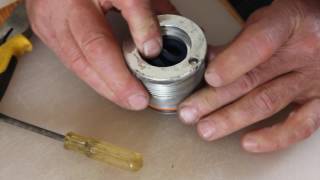 Inner seal installation on a 632 Bobcat lift cylinder repair [upl. by Etam]