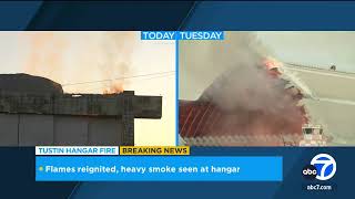 Flareups continue at Tustin hangar after massive fire Tustin Unified schools closed Monday [upl. by Evreh133]