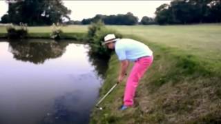 Drunk golfer falls in the water trying to hit golf ball [upl. by Zaragoza]