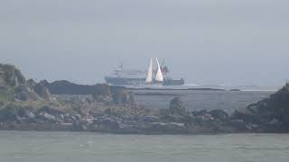 Caledonian MacBrayne Calmac Islay ferry Finlaggan amp sailing yacht pass Islay Argyll Scotland 8924 [upl. by Sonstrom]