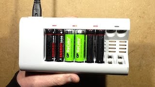 Inside a cheapo NiMh charger with schematic [upl. by Ardnosac]