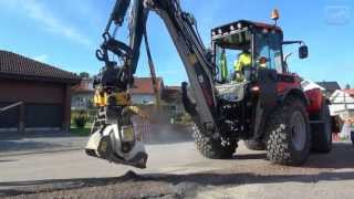 Asphalt work in a residential area with a HUDDIG 1060C [upl. by Ardnalahs]