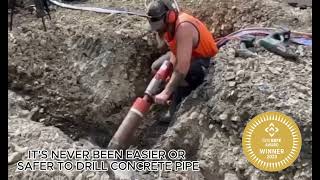 Drilling through concrete pipe with ease with the Core Drill Block wwwcoredrillblockscom [upl. by Aivek400]