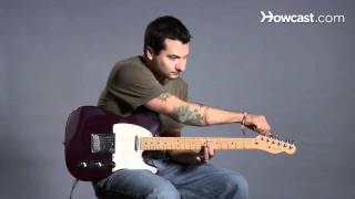 How to Tune a Guitar to E Flat  Guitar Lessons [upl. by Yemrej140]